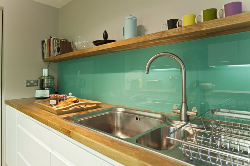 Apron for the kitchen of glass: how to choose and install the panel