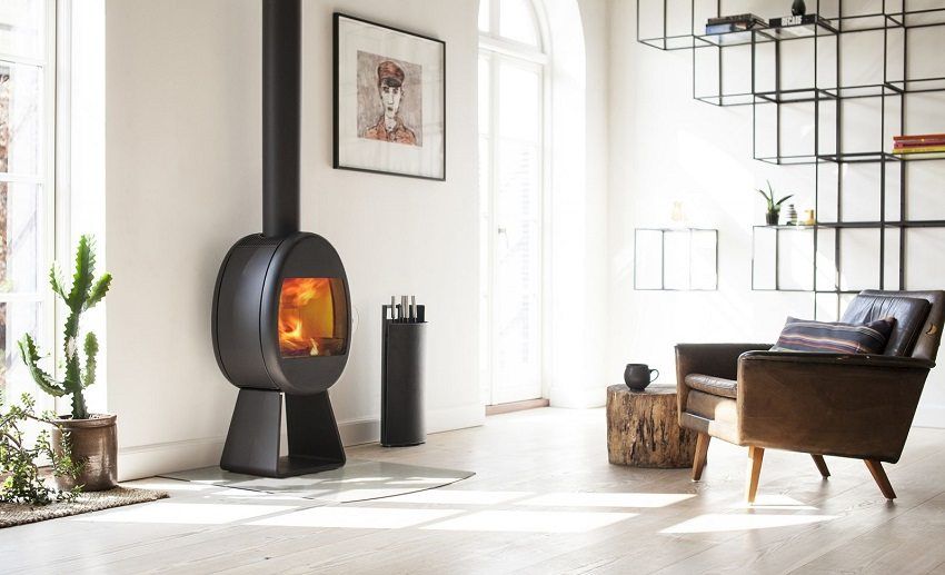 The furnace fireplace for giving long burning: we create heat and a cosiness in a country house