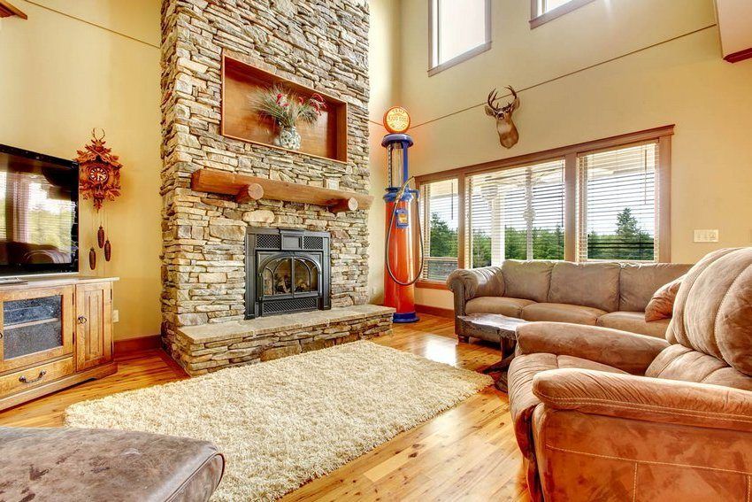 Wood fireplaces for the home: a stylish accent in a rustic interior