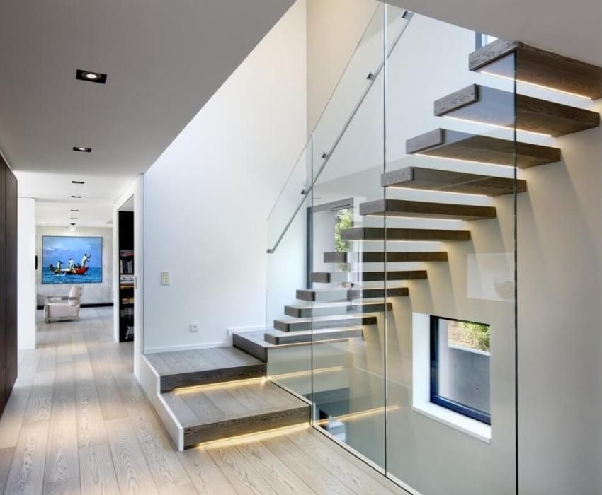 Stairs to the second floor in a private house: photos, types of structures and materials