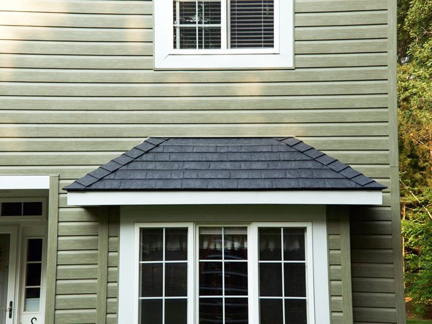 Metal siding under the tree: how to decorate a new or update the old facade