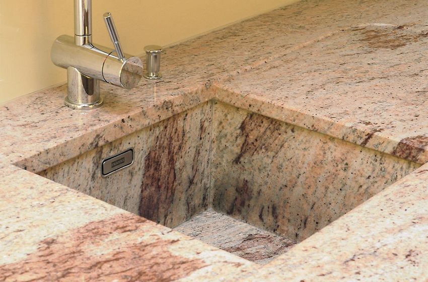 Sink for kitchen from an artificial stone: characteristics, features of the choice and leaving