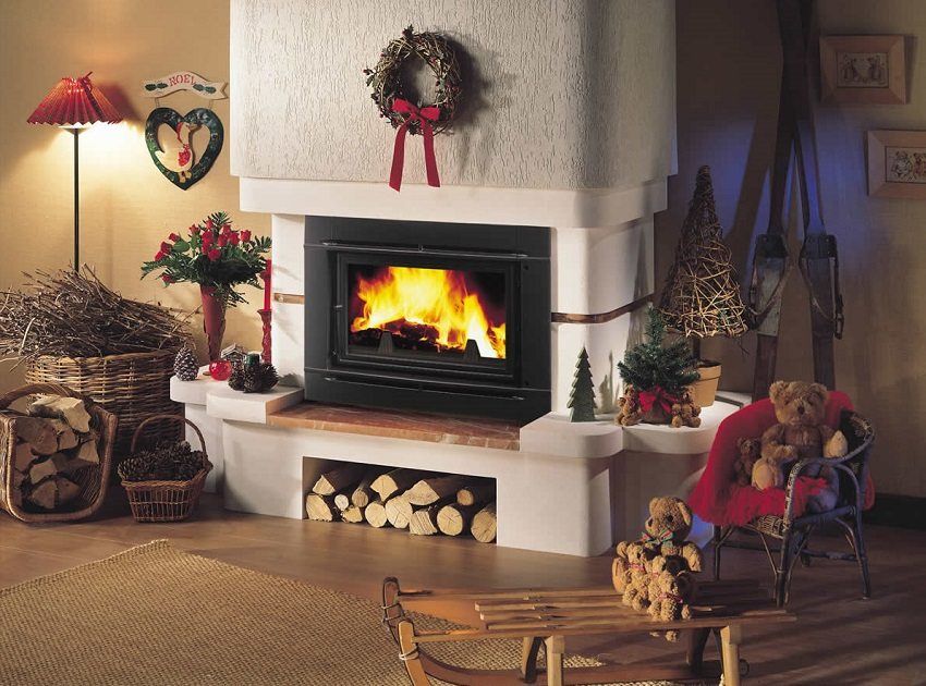The furnace fireplace for giving long burning: we create heat and a cosiness in a country house