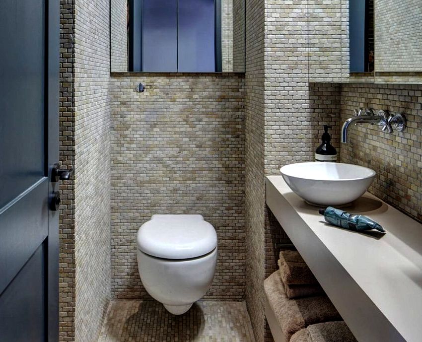 Tile for the toilet: tips on choosing and laying their own hands