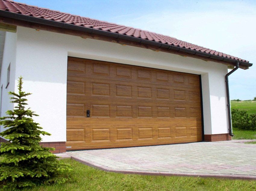 Sectional doors to the garage: the size and price of practical designs