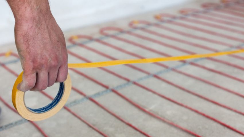 Laying underfloor heating under tiles: the technology of self-installation system